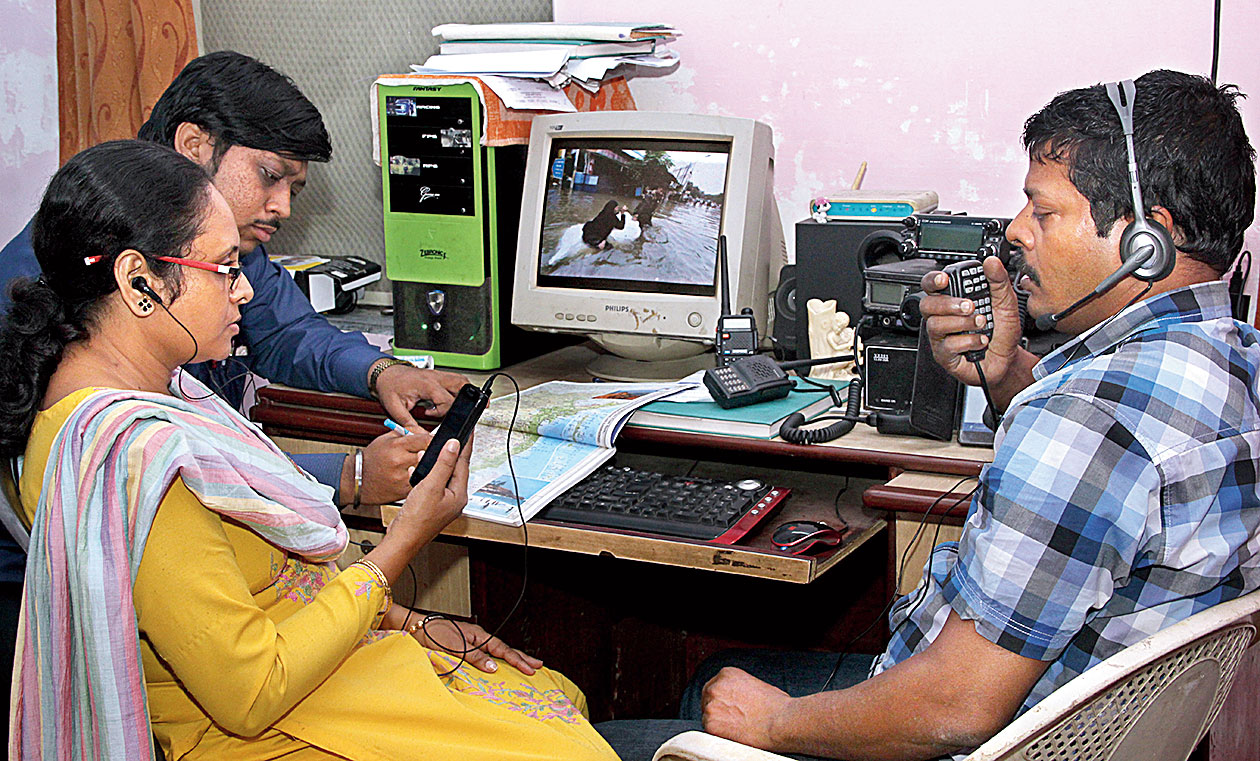 Wave length: Ambarish Nag Biswas (right) helps in rescue work from Calcutta through ham radio during the 2015 Chennai floods  
