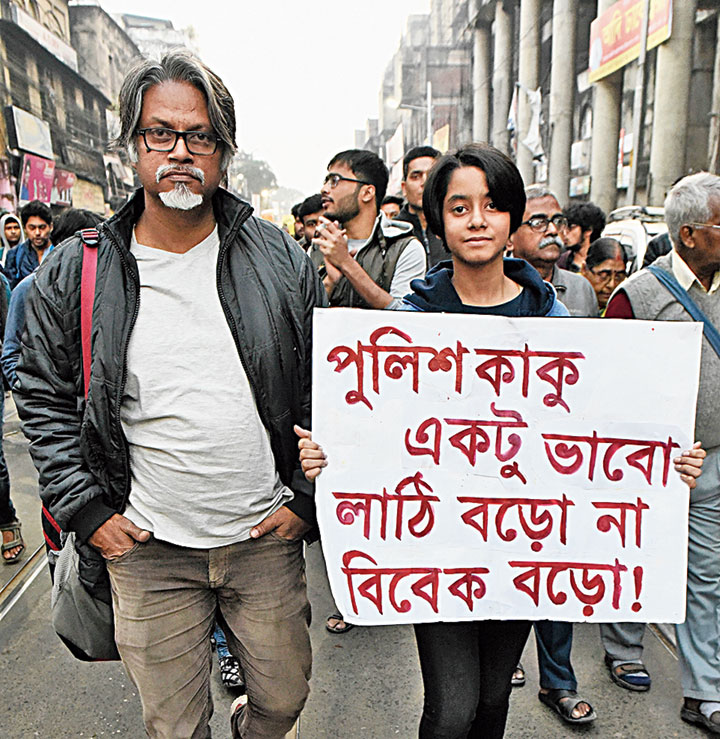 Anupam Das, 48, and Anwesha Das, a Class VII student, from Howrah Chanting azaadi, father and daughter marched together on College Street
