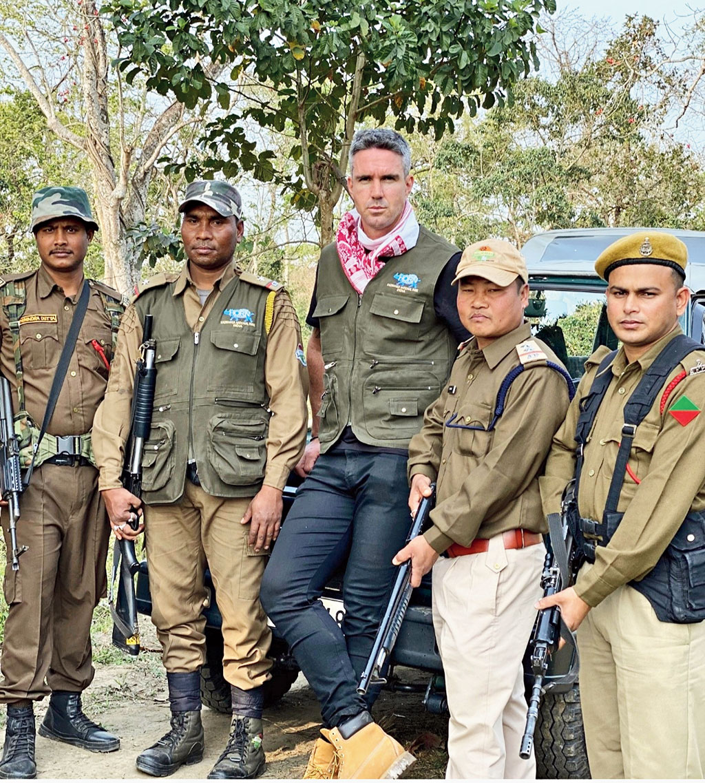 Kevin Pietersen with the forest guards in Kaziranga. 
