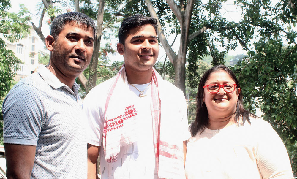 Riyan Parag with his parents at their residence in Guwahati on Tuesday