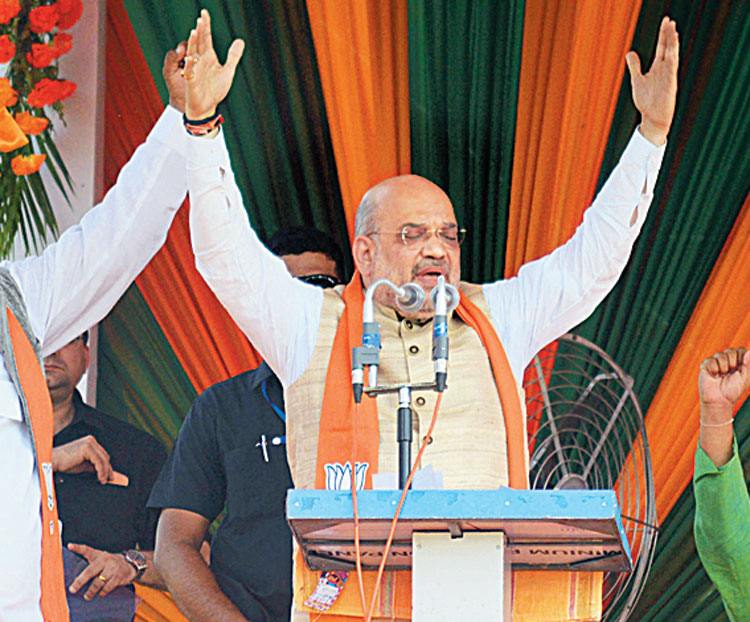 Amit Shah addresses the meeting in Alipurduar on Friday