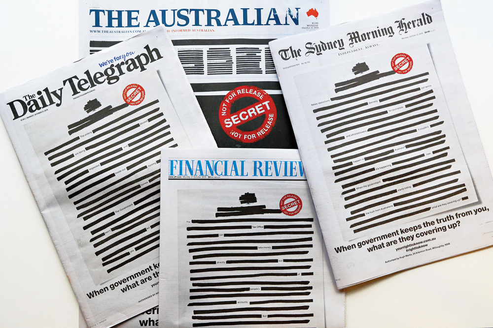 Australian newspapers black out front pages in fight for press freedom