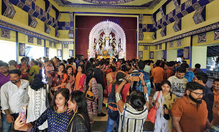 Pandal-hoppers were out in numbers on the streets through Wednesday

