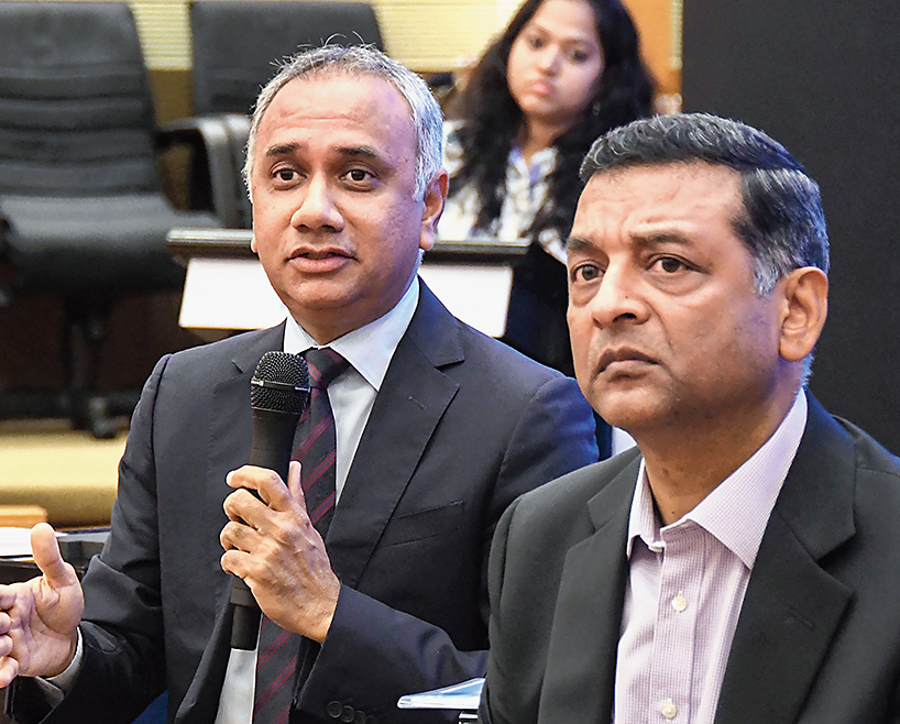 Infosys CEO Salil Parekh (left) and CFO Nilanjan Roy  in Bangalore on Friday. 
