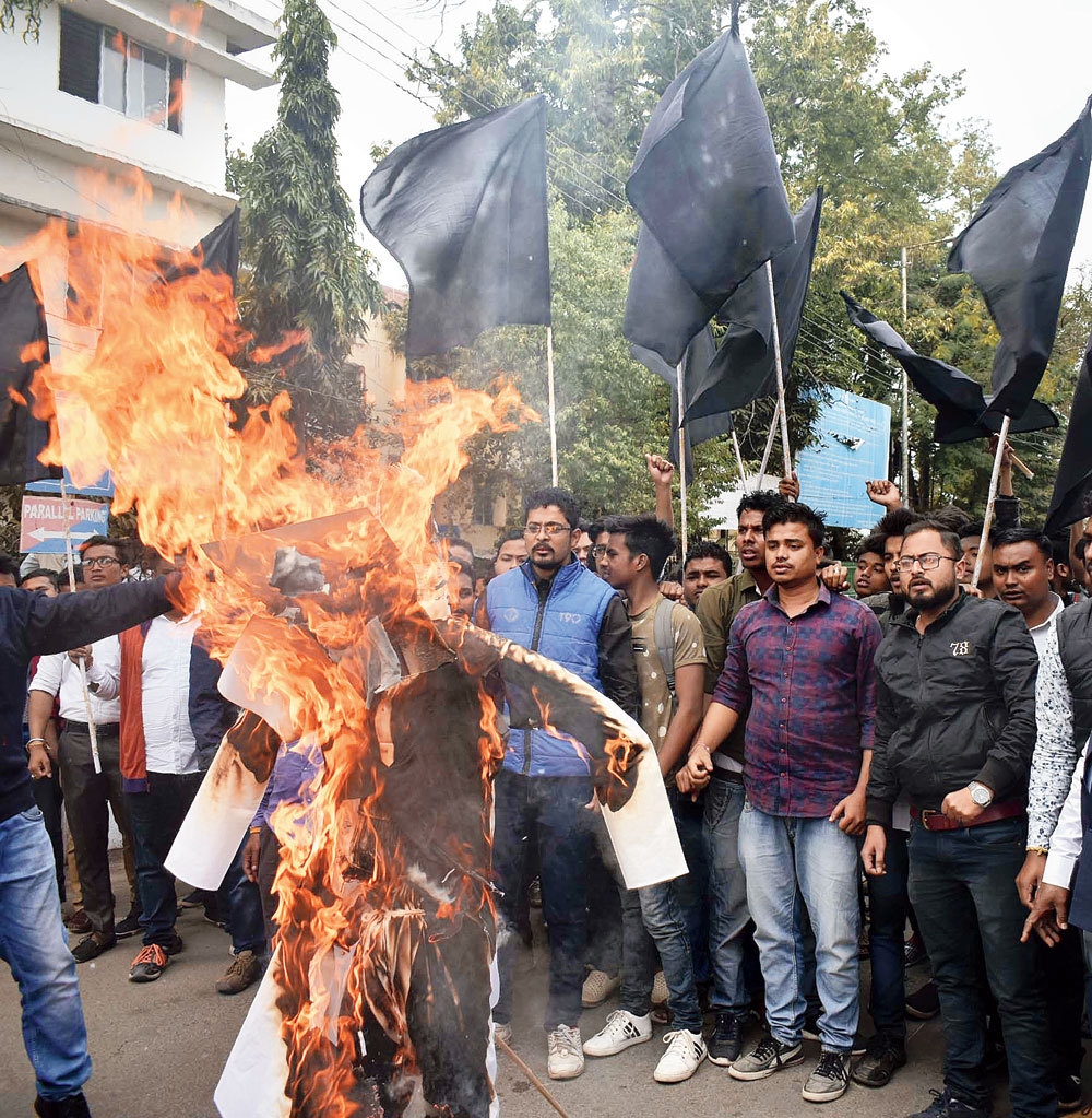 Activists of the All Assam Students Union (AASU) burn the effigy of Prime Minister Narendra Modi in Guwahati on February 9 in protest against the Lok Sabha passing the “anti-Assam” Citizenship (Amendment) Bill in January