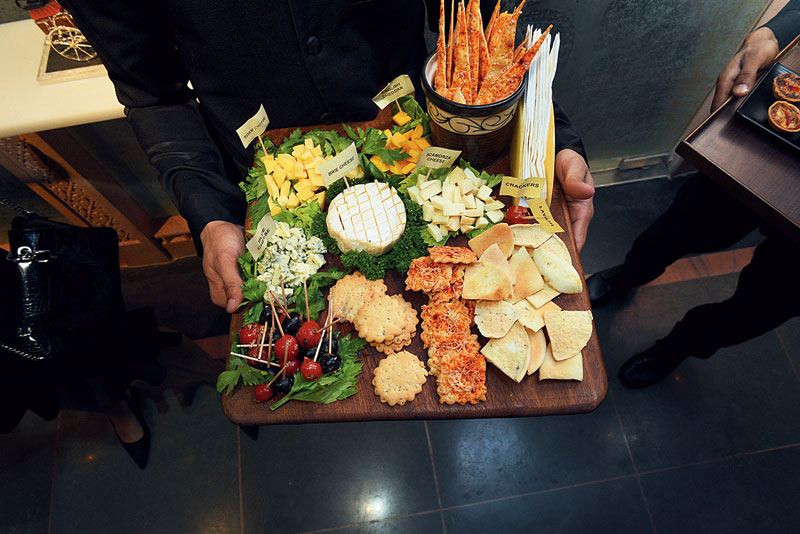 (L-R) No party is complete without food and tipple! Cheese platters to continental spread, the list of munchies was long!