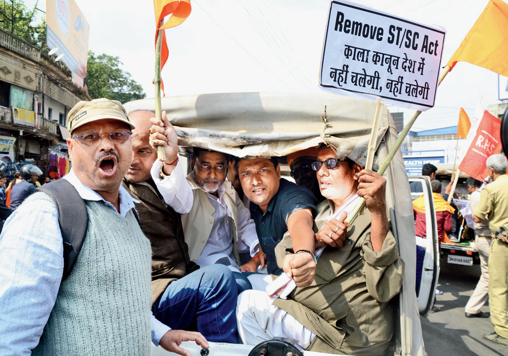 Down with ‘black law’: Protesters at Albert Ekka Chowk in Ranchi being taken into preventive custody on Tuesday. 