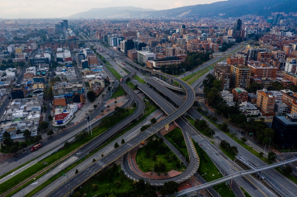 An empty cloverleaf tells the story of a city on lockdown in Bogota, March 20, 2020