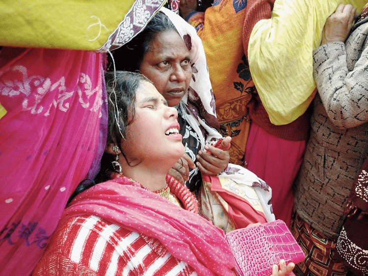 A woman who fell unconscious in the melee.