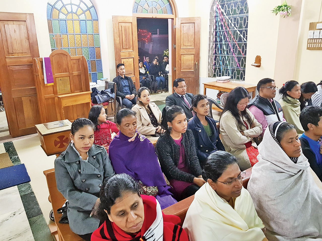 Meghalaya chief minister Conrad K. Sangma and his family attend a midnight mass on Tuesday.