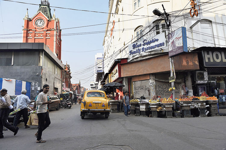 A taxi enters Finick Bazaar Street from Lindsay Street