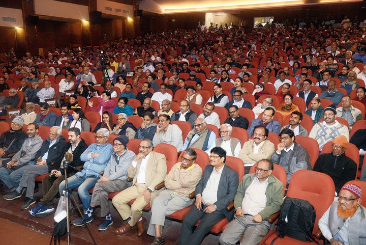 The packed auditorium during his speech