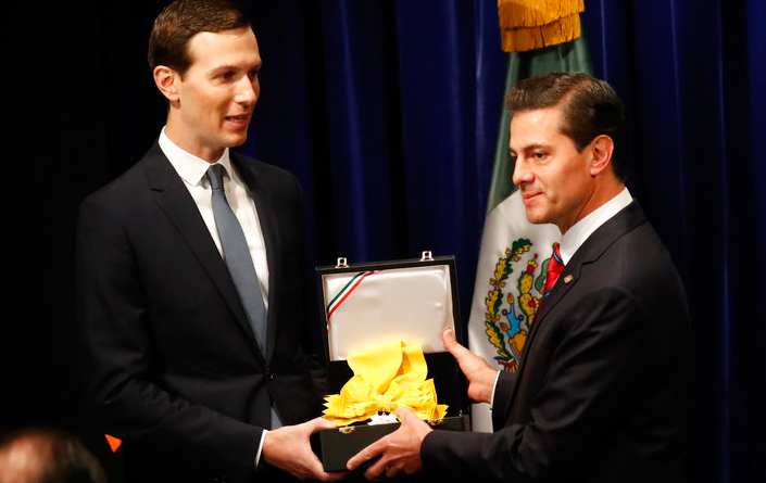 Mexican President Enrique Pena Nieto, right, awards White House Senior Adviser Jared Kushner with The Order of the Aztec Eagle, the highest Mexican order awarded to foreigners on Friday, Nov. 30, 2018 in Buenos Aires, Argentina. 