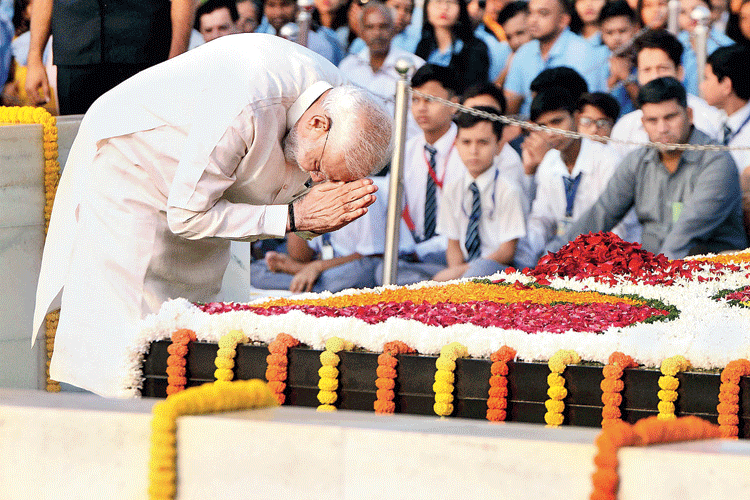 Prime Minister Narendra Modi pays tribute to Mahatma Gandhi at Rajghat on October 2, 2019. 