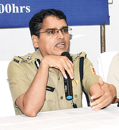 Police commissioner Laxmi Narayan Meena at the meeting with residents.