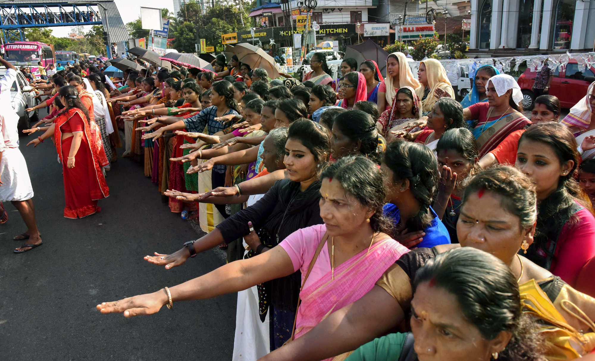 Thousands of women take part in the 'women’s wall' against communalism and gender discrimination, in Kochi, Kerala on Tuesday, January 1, 2019. 