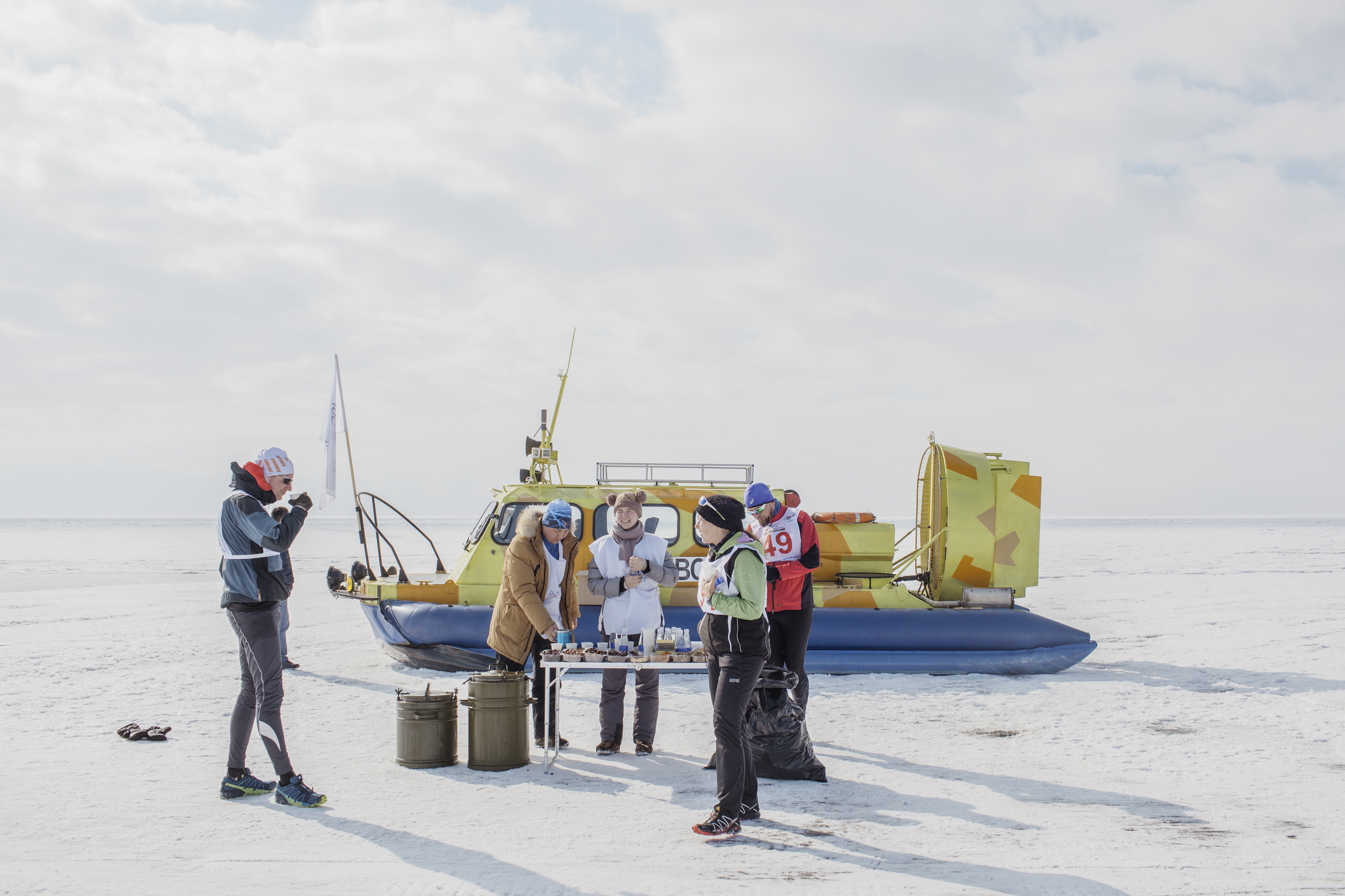A snack and water table on the frozen surface of Lake Baikal during the ice marathon.