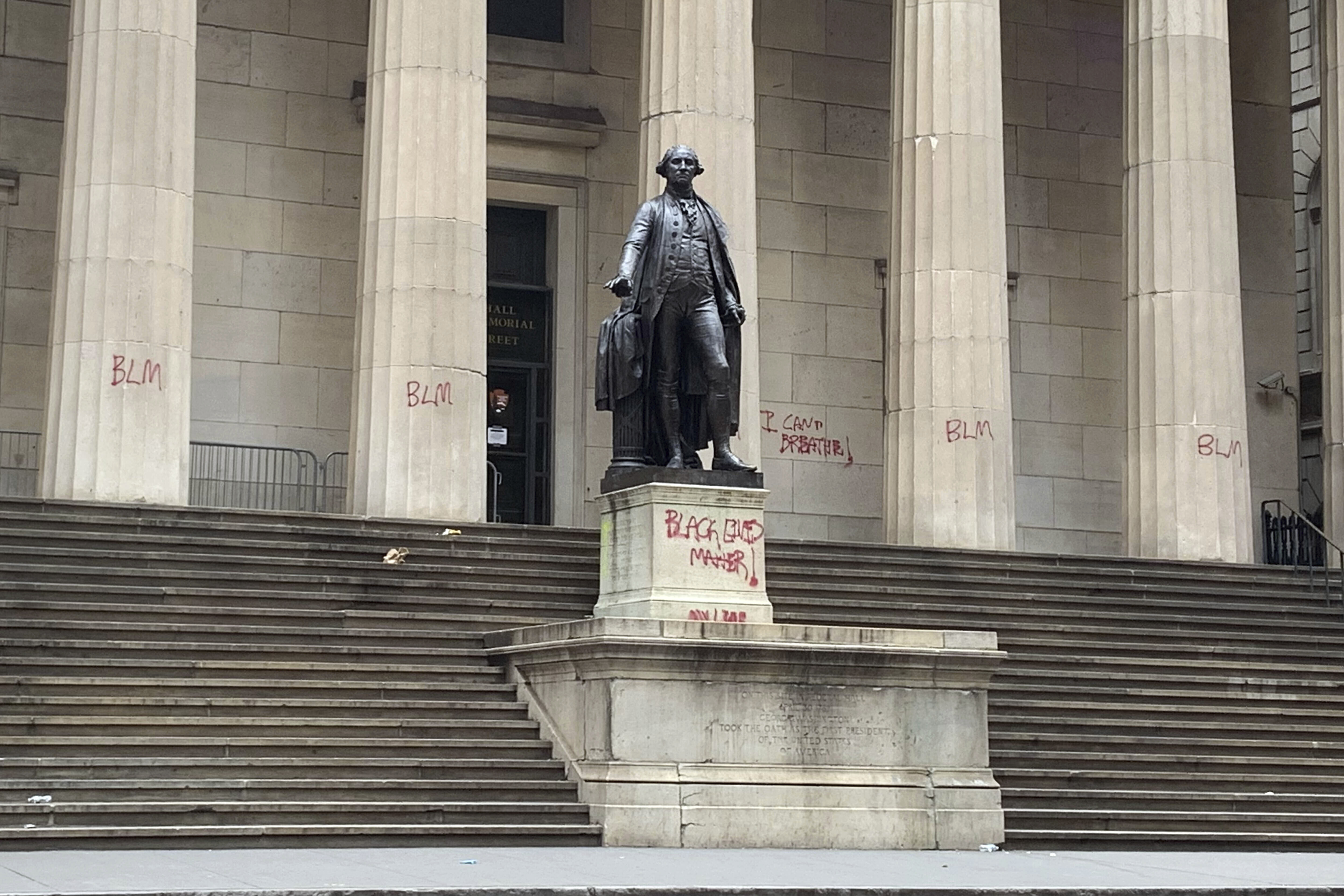 The pedestal for George Washington and several columns of Federal Hall on New York's Wall Street 