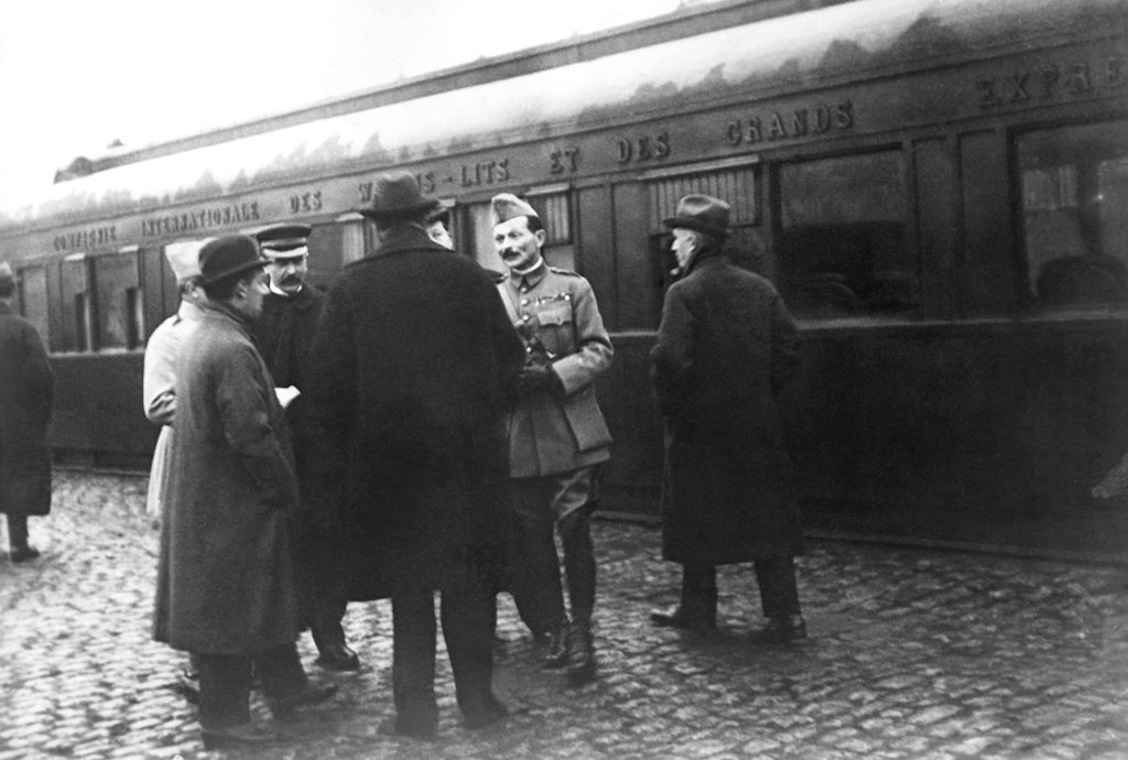 In this photo from November 1918, German and French delegations wait in Rethondes for the start of the train to the Armistice conference in the Forest of Compiegne, France.