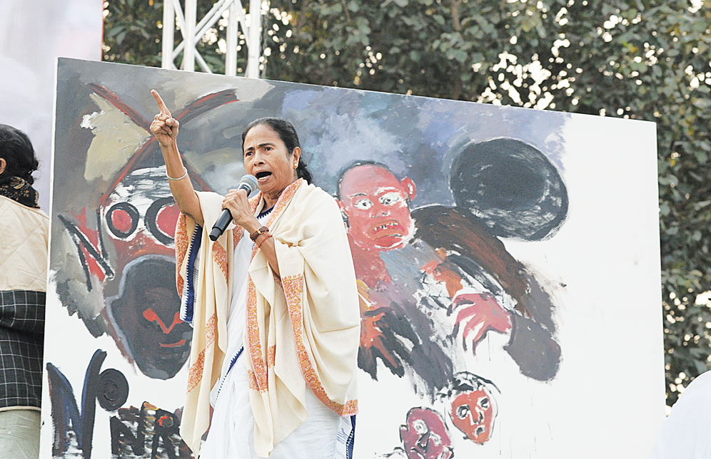 Mamata addresses the rally at Park Circus in Calcutta on Friday.