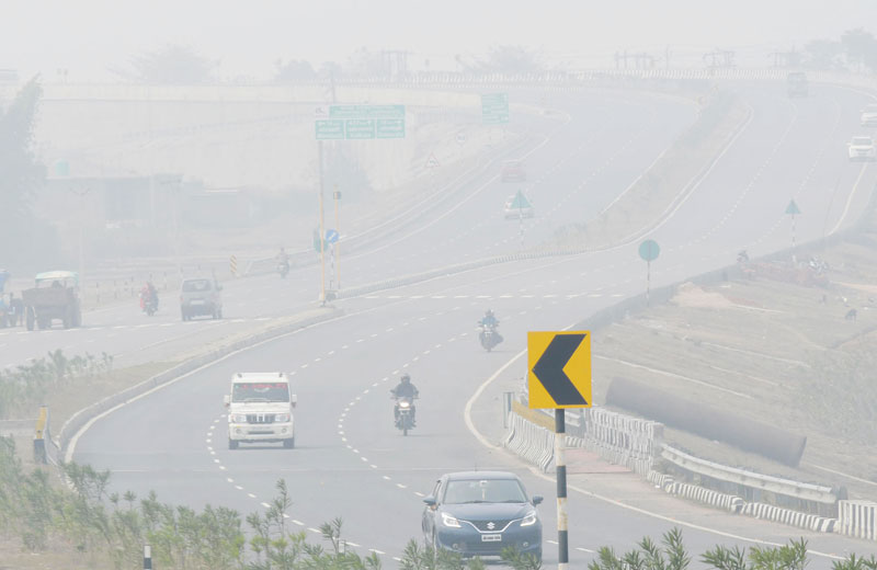 Vehicles negotiate a foggy stretch of Ormanjhi Ring Road in Ranchi on Thursday. 
