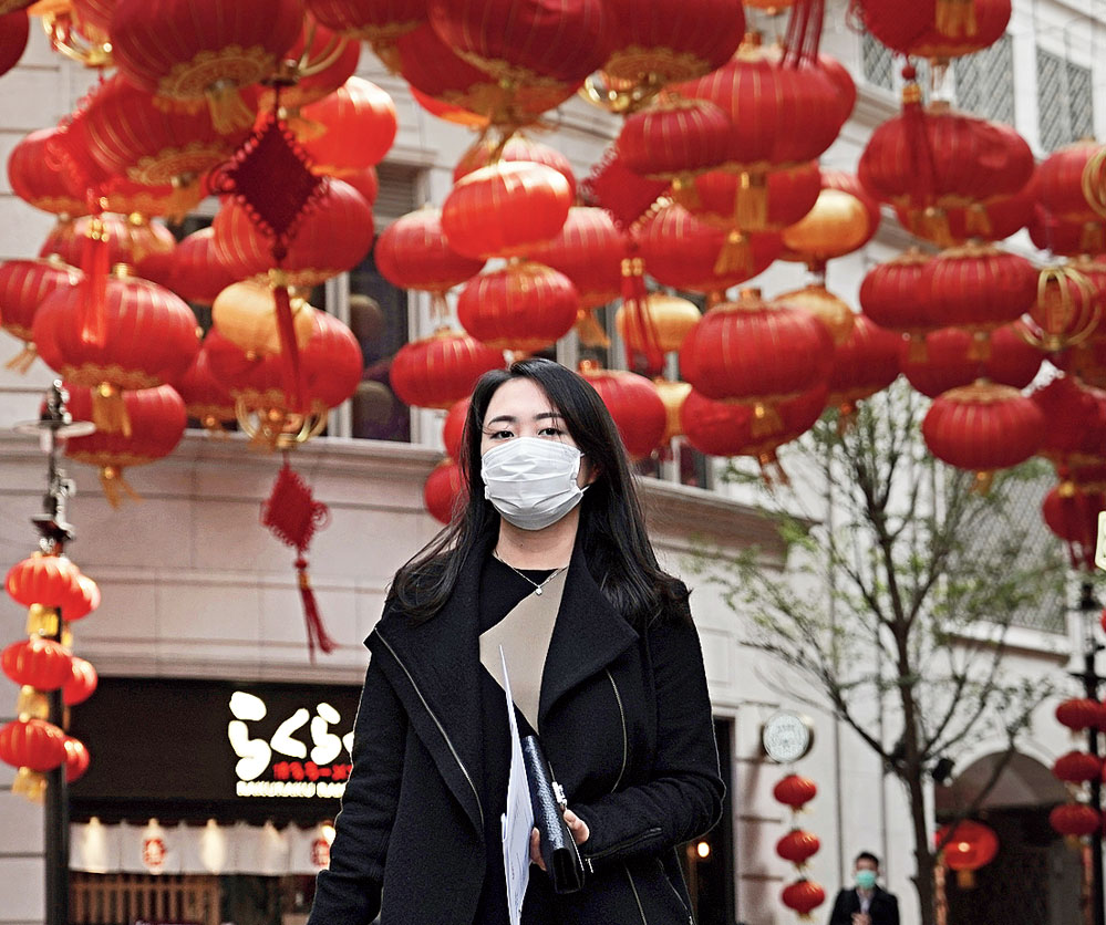 A woman in a mask in Hong Kong on Thursday