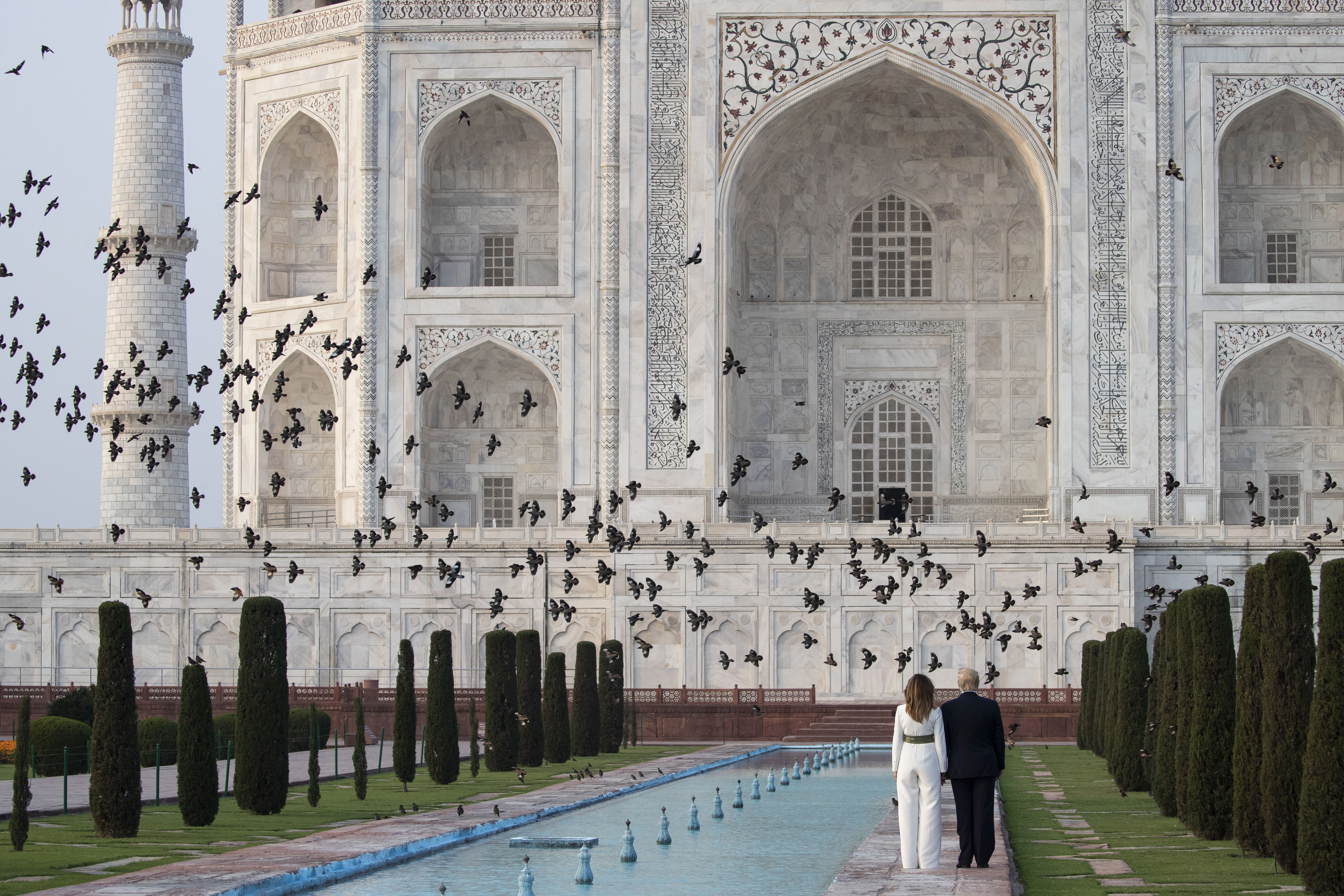Birds fly as US president Donald Trump, with first lady Melania Trump, tour the Taj Mahal, Monday