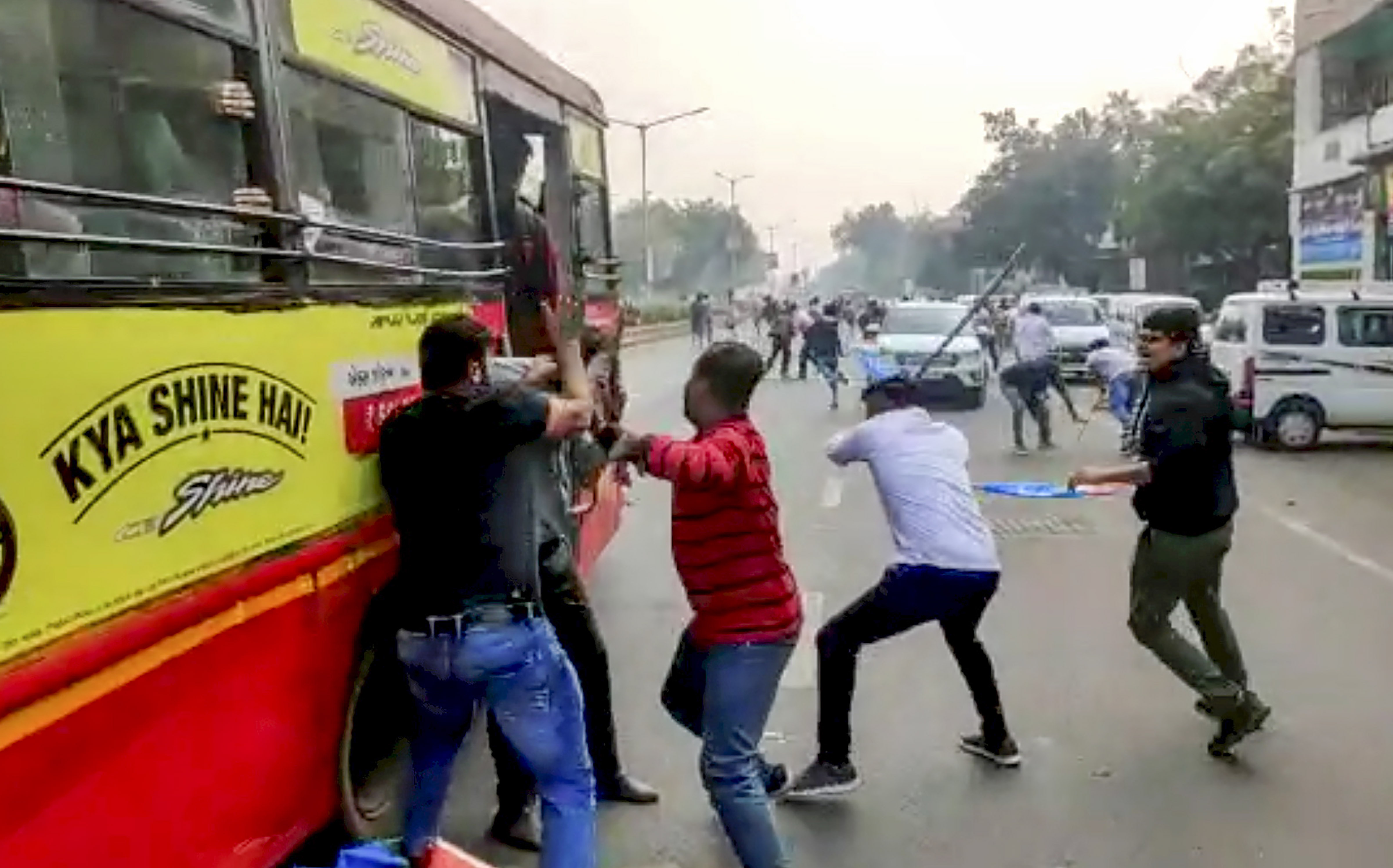 A screenshot taken from a video footage shows ABVP and NSUI students engaged in a violent clash in Ahmedabad, Gujarat, Tuesday, January 7, 2020. 