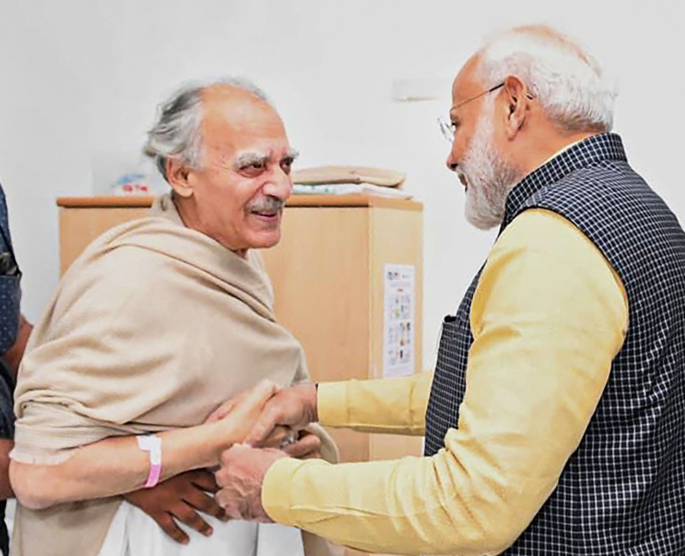 Prime Minister Narendra Modi meets former union minister Arun Shourie at a hospital, in Pune on Sunday, December 8, 2019.