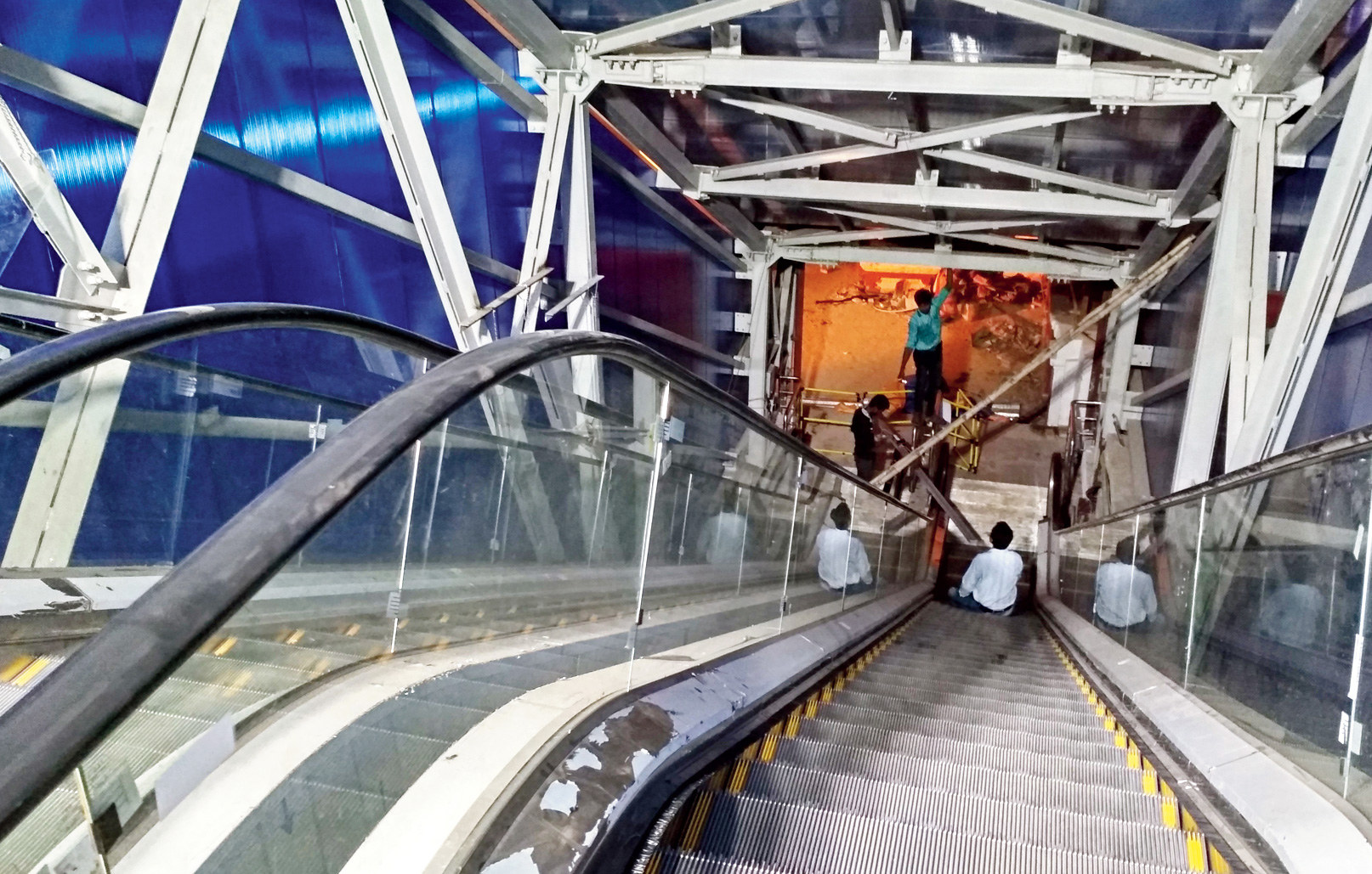 One of the 14 escalators to get on and off the skywalk.