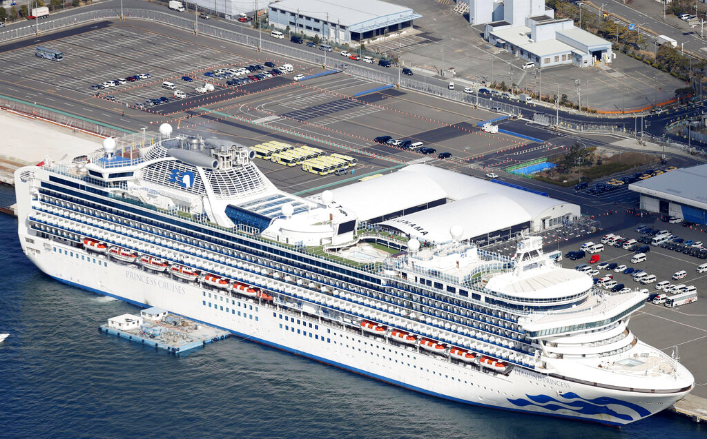 The quarantined Diamond Princess cruise ship is anchored at a port in Yokohama, near Tokyo on Wednesday