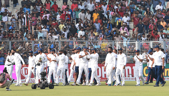 Team India players and support staff take a lap of honour at Eden Gardens after their innings and 46-run win on Sunday.  