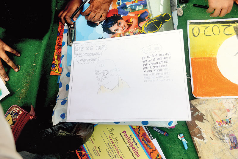 Class IV student Daraksha Parveen drew a portrait of Mahatma Gandhi and wrote about him. “He is the father of the nation,” she said