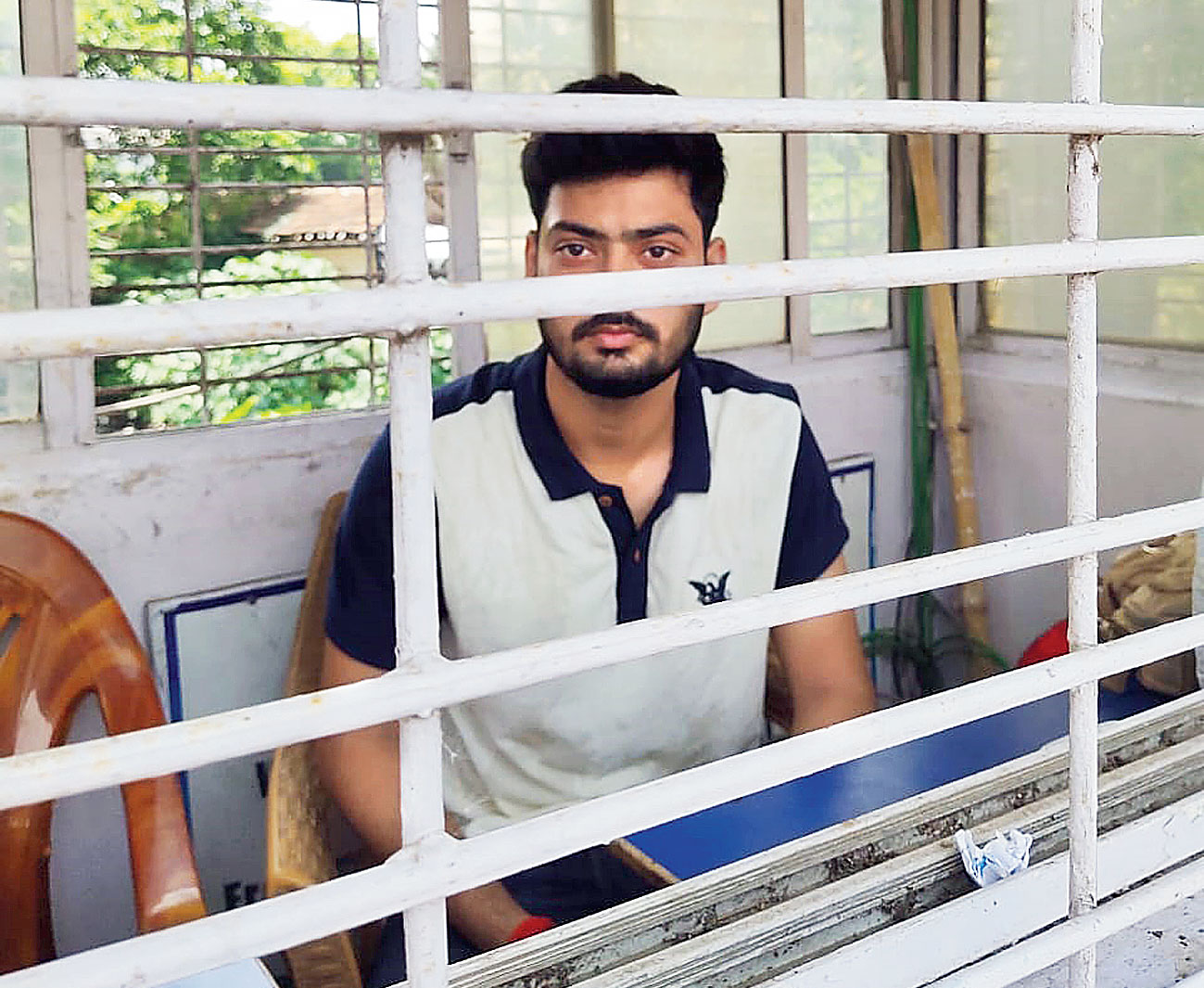 Vikrant Singh at an Anandapur police kiosk after he was arrested on July 18