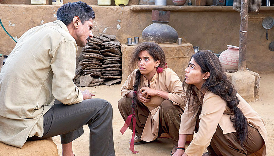 Sanya Malhotra | Pataakha: A firecracker with two sisters standing in for  warring nations - Telegraph India