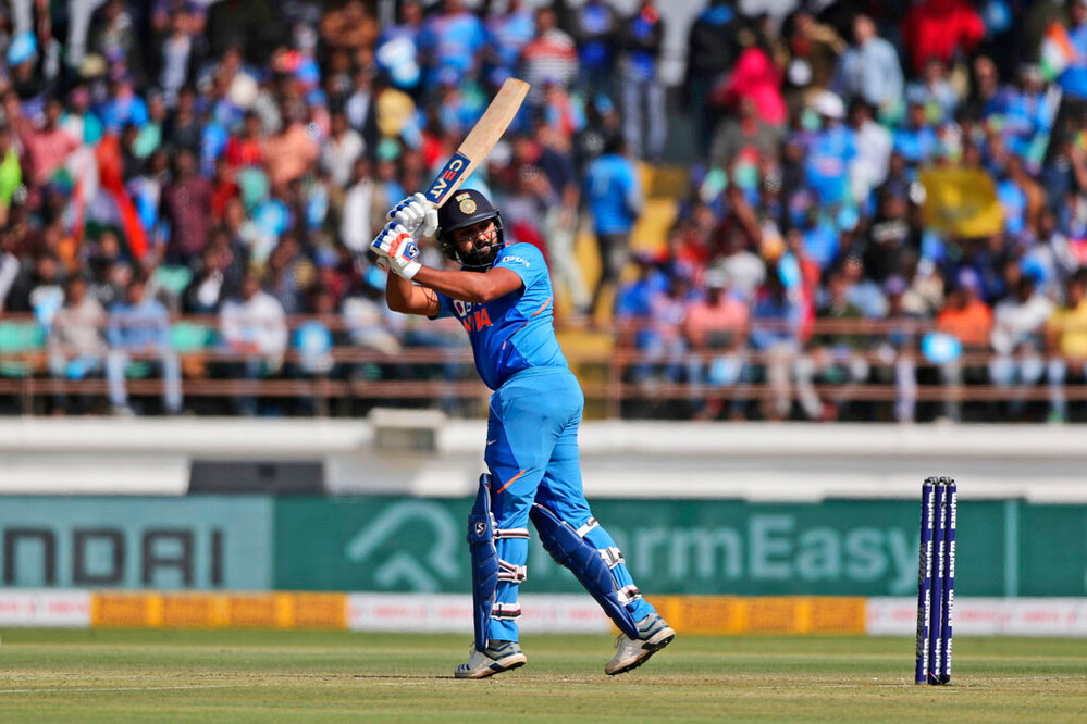 Rohit Sharma plays a shot during the second one-day international cricket match between India and Australia in Rajkot on Friday