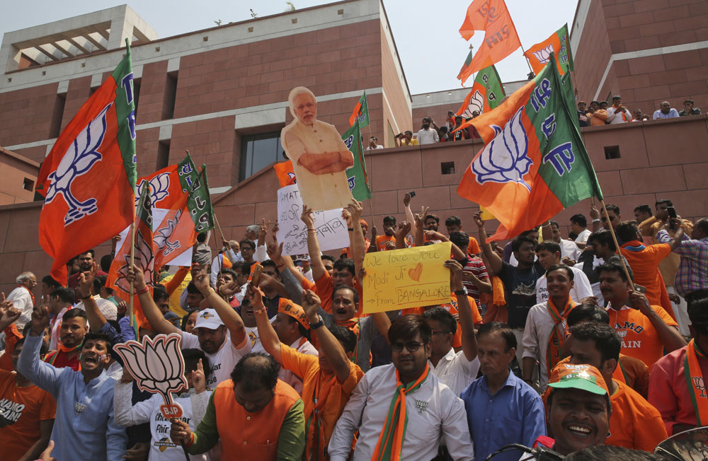 BJP supporters celebrate their party's victory in New Delhi on Thursday, May 23, 2019. This is the time for active citizenship in order to put forth another national vision for a humane and united India