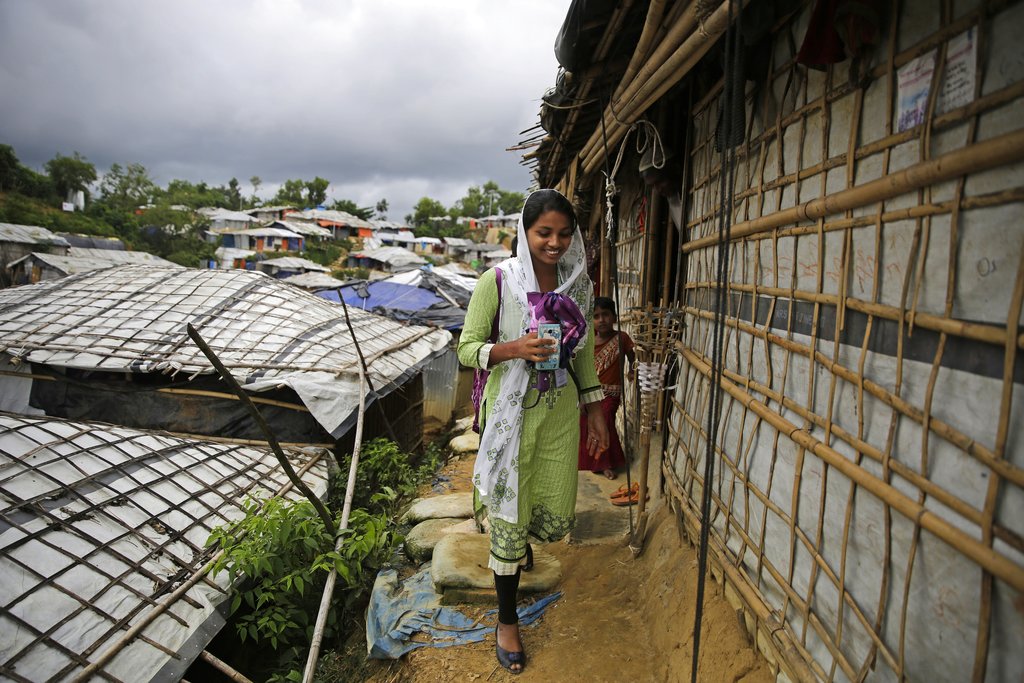 Rahima Akter walks through the Balukhali refugee camp in Bangladesh.
