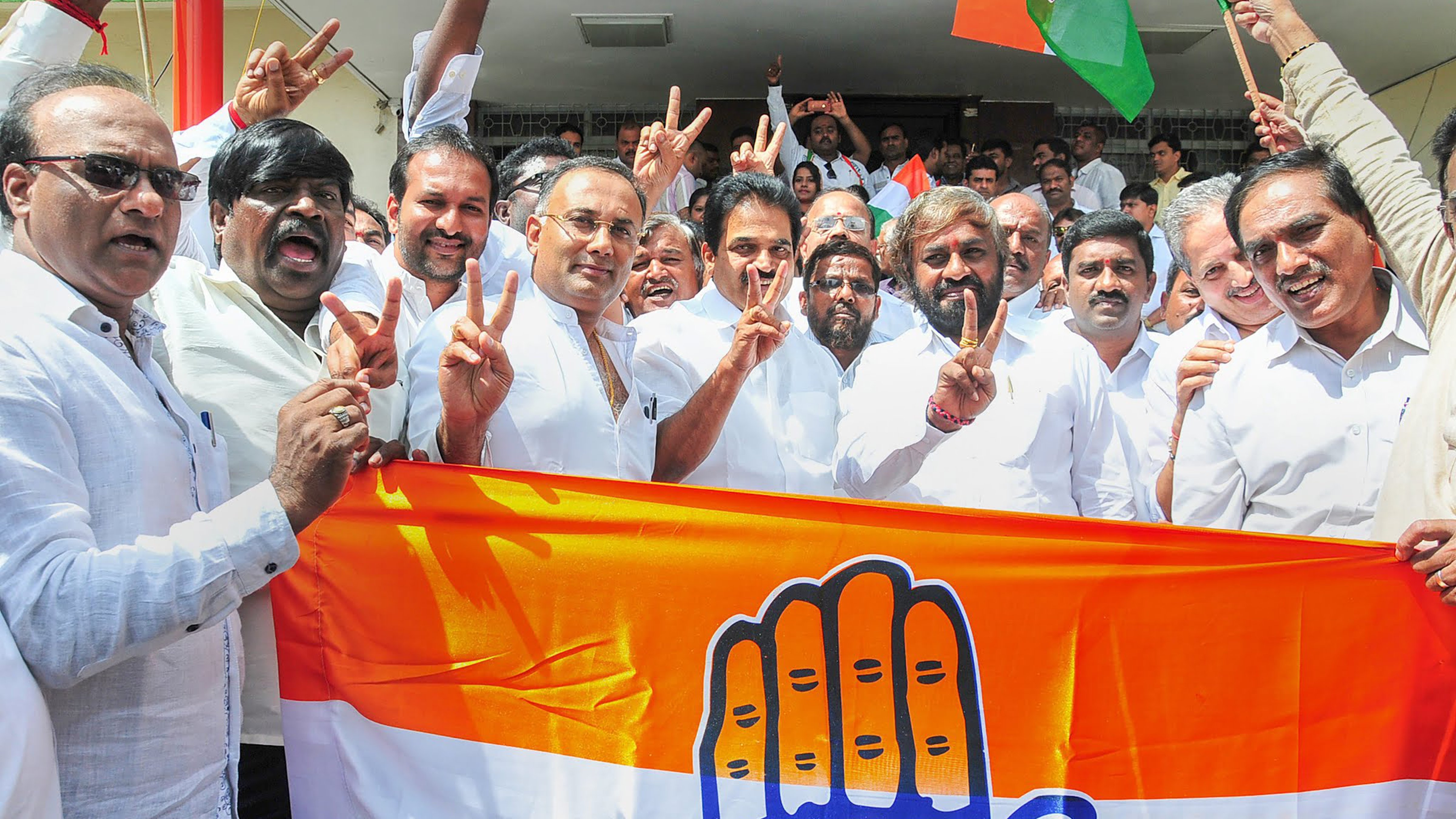 Congress leaders celebrate in Bengaluru after the bypoll victories on Tuesday.
