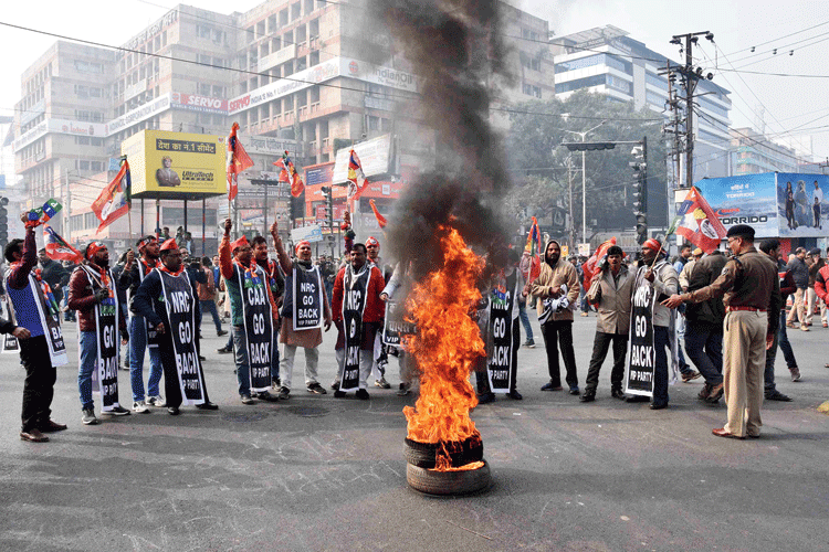 Protesters in Patna burn tyres during the bandh on Saturday. 