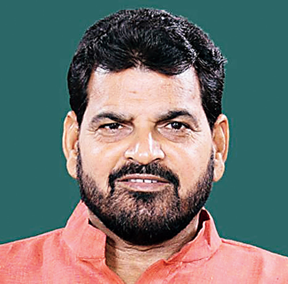 Kaisarganj MP Brijbhushan Saran Singh who faces more than half-a-dozen cases of attempt to murder, robbery and rioting.