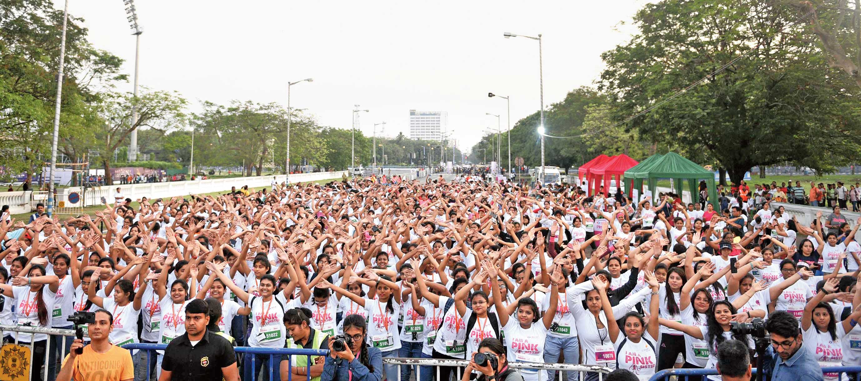 Participants at the third edition of Pinkathon, in association with The Telegraph, warm up to some zumba beats on Sunday morning. 
