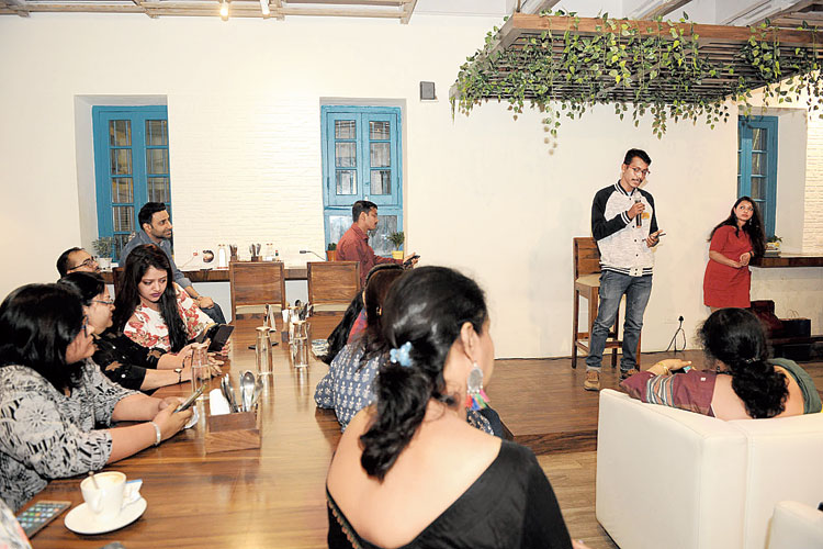 An open mic poetry session at Artsy cafe in Minto Park