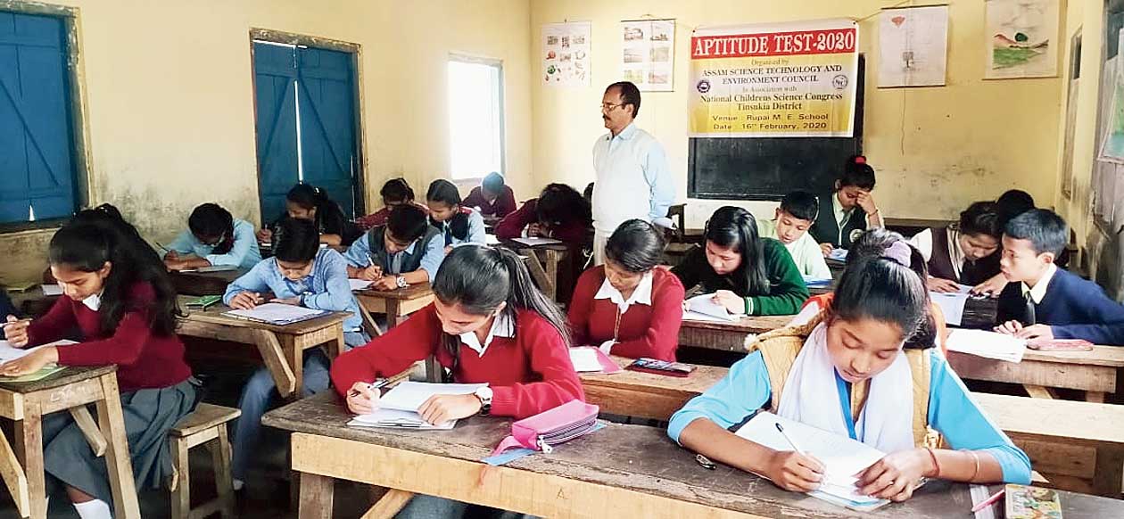 Students appearing in examination in Tinsukia on Tuesday.