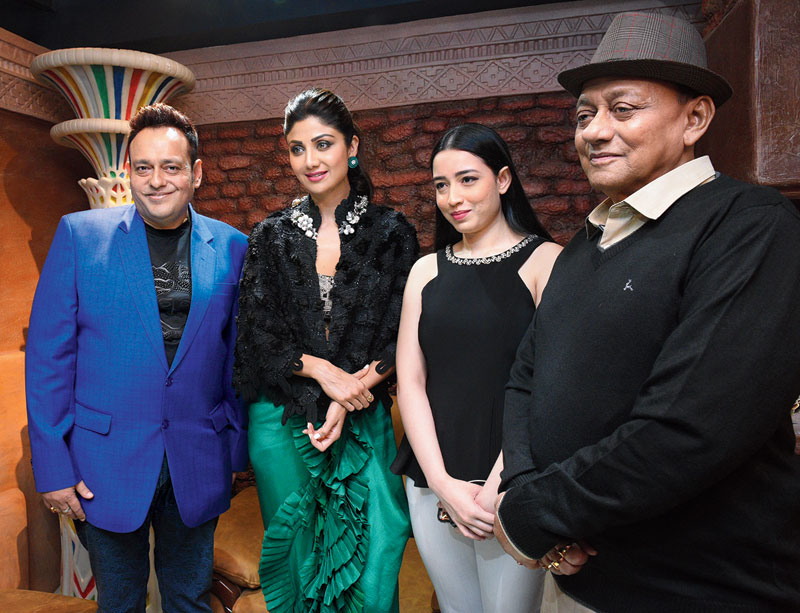 Owners of Dutta’s — Arijit, with daughter Amritagandha, and father Samirendra Nath Dutta, with Shilpa.