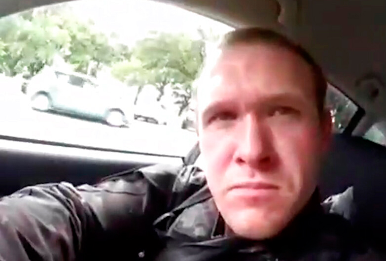 A picture taken from a video shows a gunman, who used the name Brenton Tarrant on social media, in a car before the mosque shootings in Christchurch, New Zealand