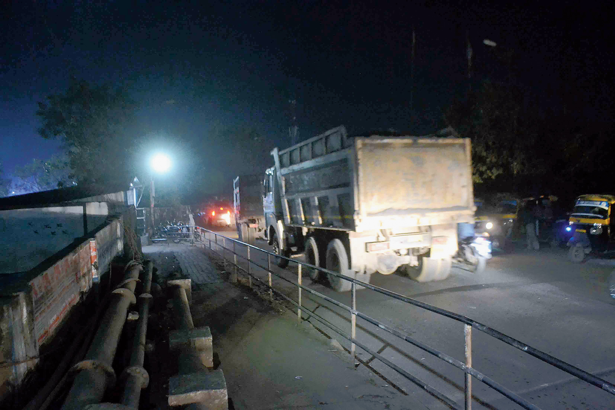 Truckload: A 10-wheel dumper plies on Burmamines railway overbridge in Jamshedpur on Friday night. 