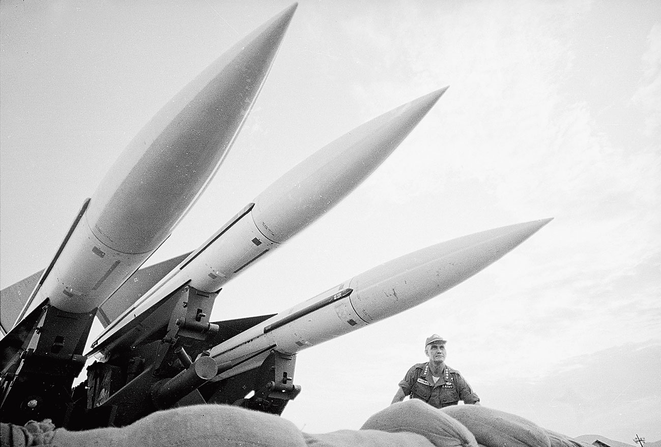 Gen. William C. Westmoreland, commander of American forces in South Vietnam, with anti-aircraft missiles in Da Nang, Vietnam, in February 1965. 
