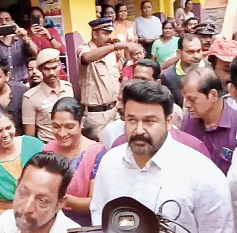 Mohanlal in the queue outside the booth in Mudavanmugal Upper Primary School in Thiruvananthapuram