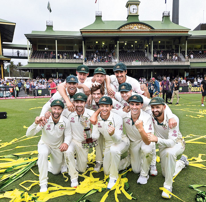Australia players after winning the Test and series against New Zealand at the SCG on Monday.